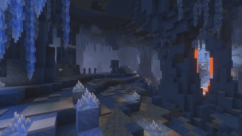 A dark Minecraft ice cave with hanging icicles, frozen terrain, distant mobs, and a lava-lit opening