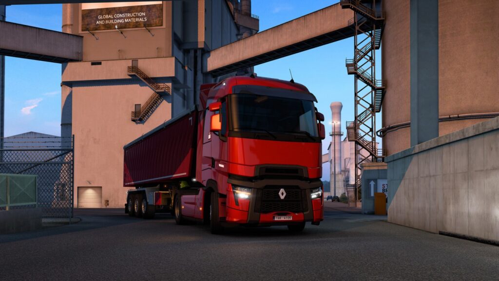 A truck drives along a divided highway in an official Euro Truck Simulator 2 gameplay screenshot