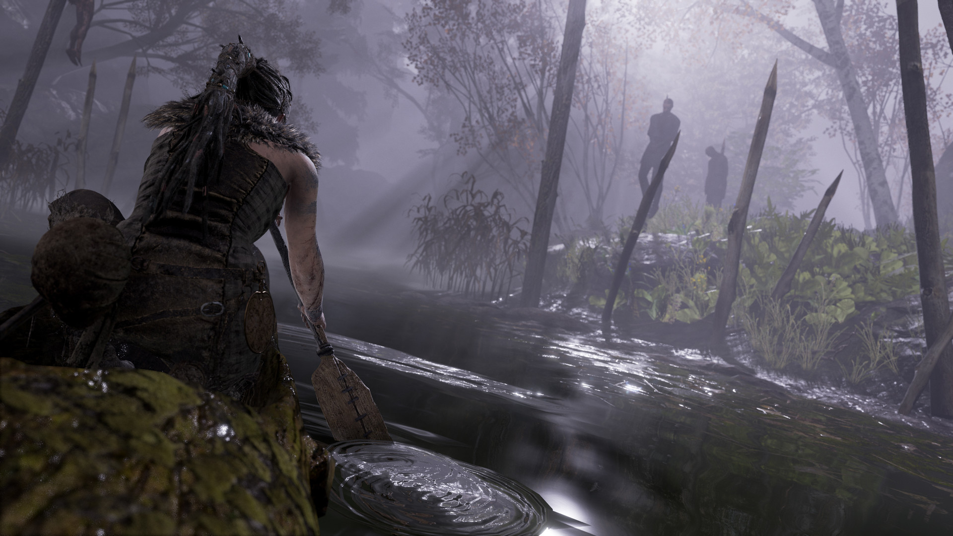 Hellblade: Senua's Sacrifice gameplay: official screenshot of Senua in a darkened Nordic landscape